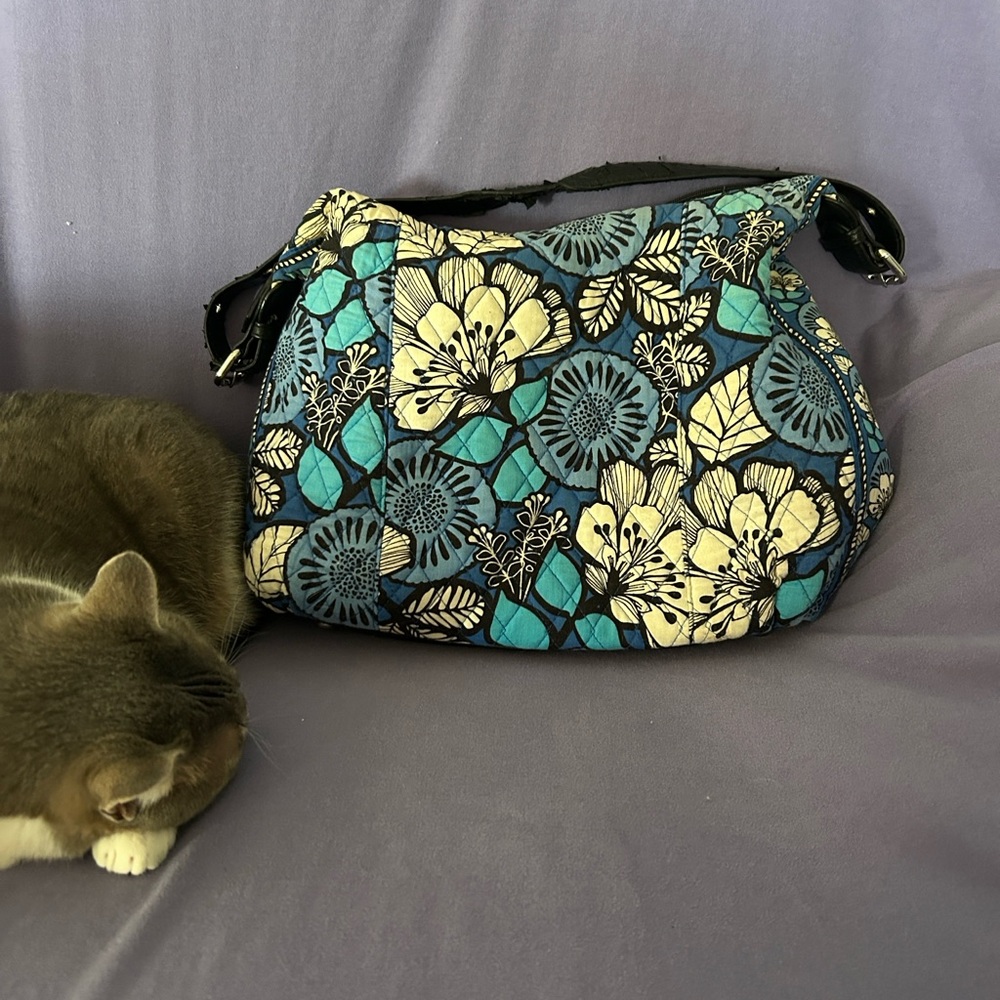 Blue/white quilted cotton shoulder bag with removable black leather strap.